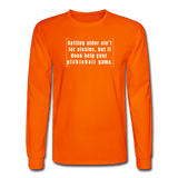 orange / S Getting older ain't for sissies, but it does help your pickleball game. - Men's Long Sleeve Tee